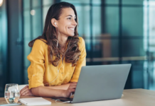 How the Right Hobbies Can Make You a Better Business Owner (2025) businesswoman with a laptop