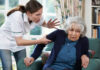 Care Worker Mistreating Senior Woman At Home