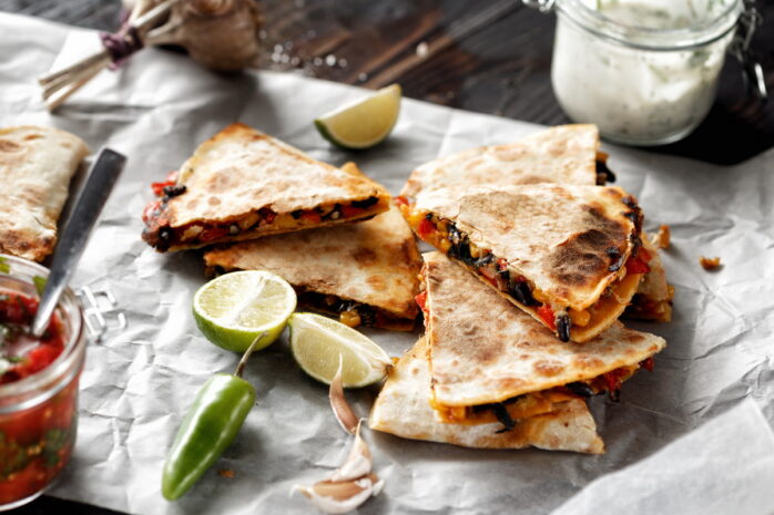 Vegetarian,Snacks:,Quesadilla,With,Vegetables,And,Cheese,On,Dark,Wooden