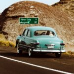 Teal Vintage Car on the road