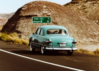 Teal Vintage Car on the road