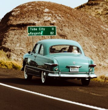 Teal Vintage Car on the road