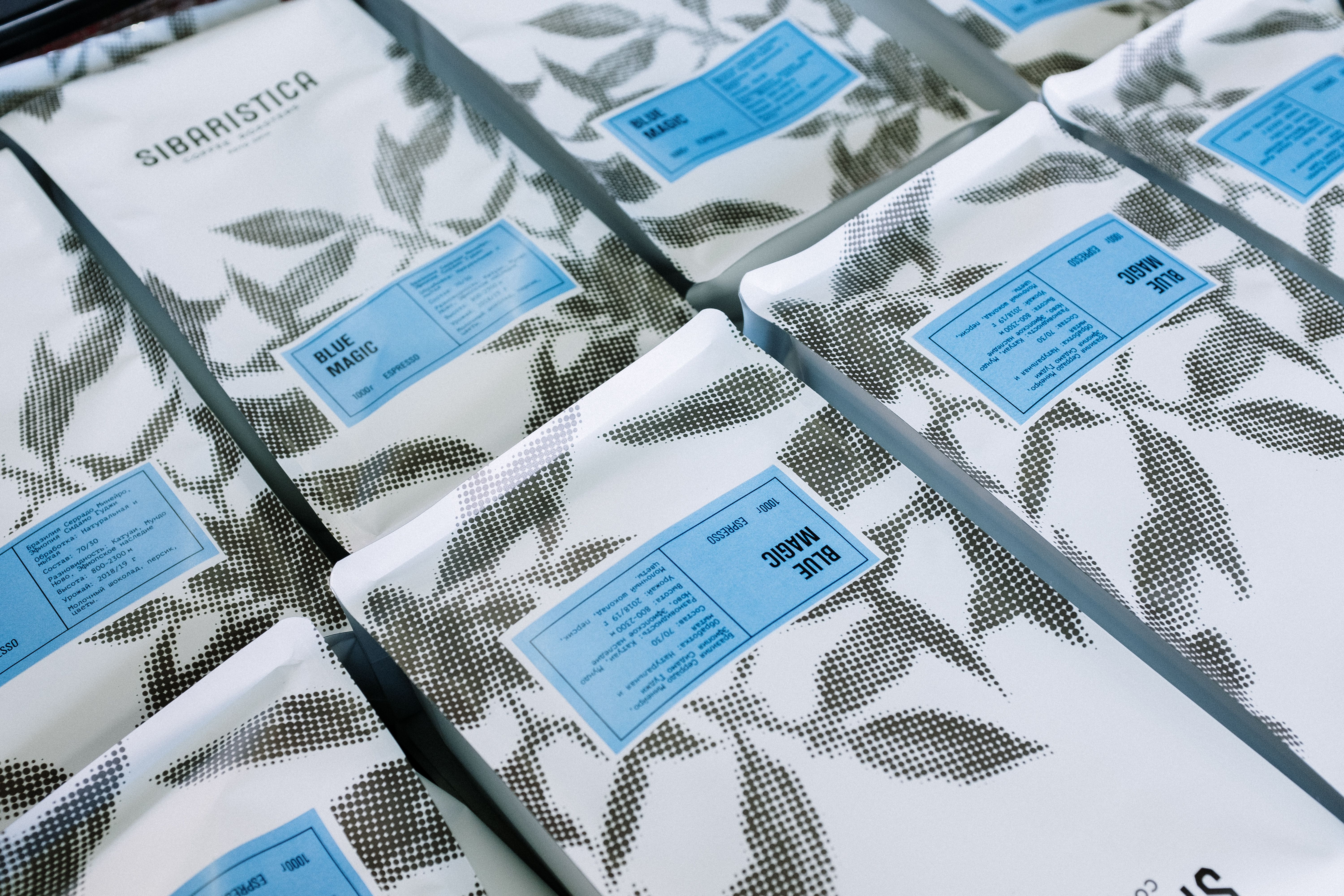 Custom printed Mylar coffee bags with artistic black and white branding design