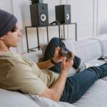 Young person on the phone playing a mobile game