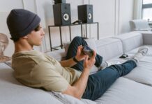 Young person on the phone playing a mobile game